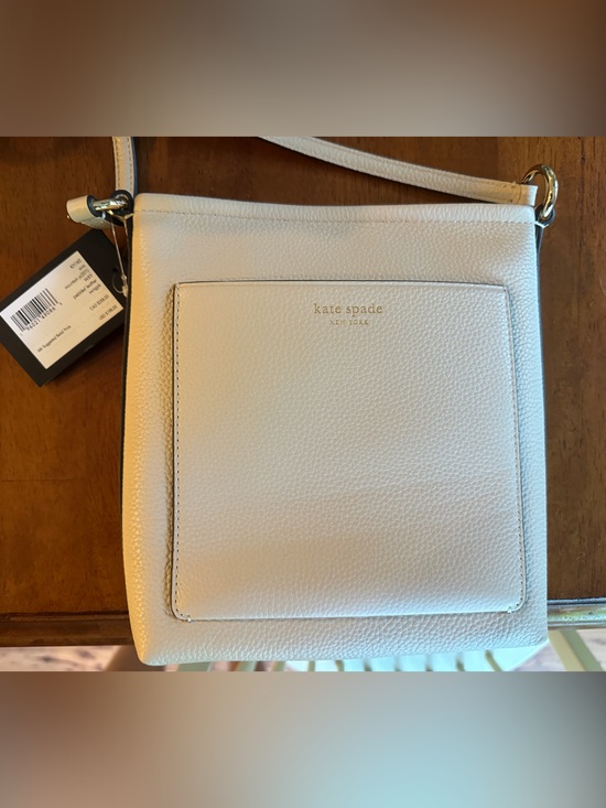 kate spade Handbags - kate spade Cream Pebbled Leather Crossbody with Front Pocket